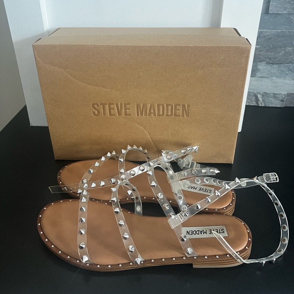 CLEAR TRANSPORT; STEVE MADDEN SANDALS